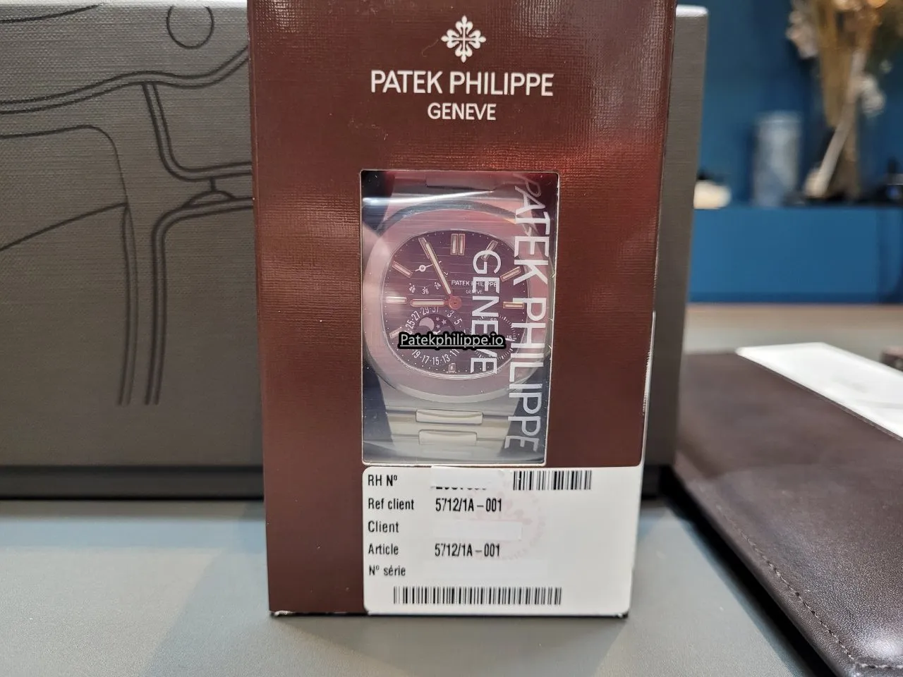 Alternative view of Patek Philippe Nautilus 5712/1a-001 40x38MM Steel Case Automatic