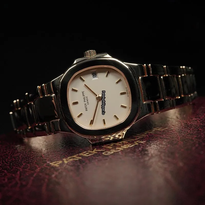 Alternative view of Patek Philippe Nautilus 4700/051j 27MM Yellow Gold Case Quartz