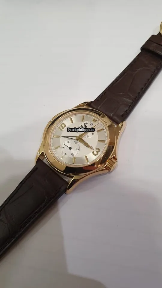 Patek Philippe Travel Time 5134j 37MM Yellow Gold Case Manual Winding