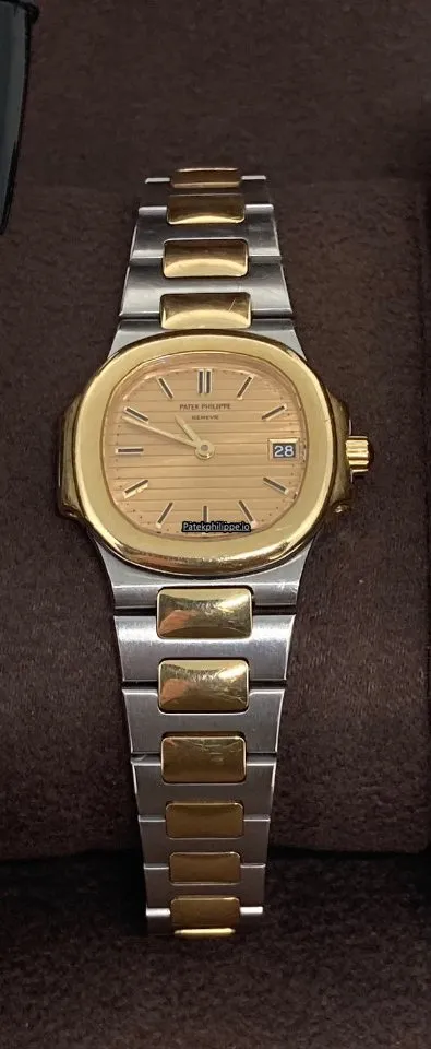 Alternative view of Patek Philippe Nautilus 4700/001 26x25MM Gold/steel Case Quartz