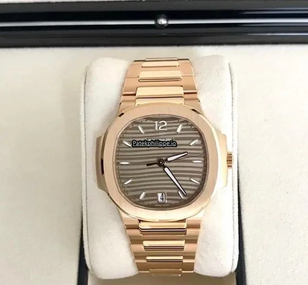 Patek Philippe Nautilus 7118/1r-010 35.2MM Rose Gold Case Automatic