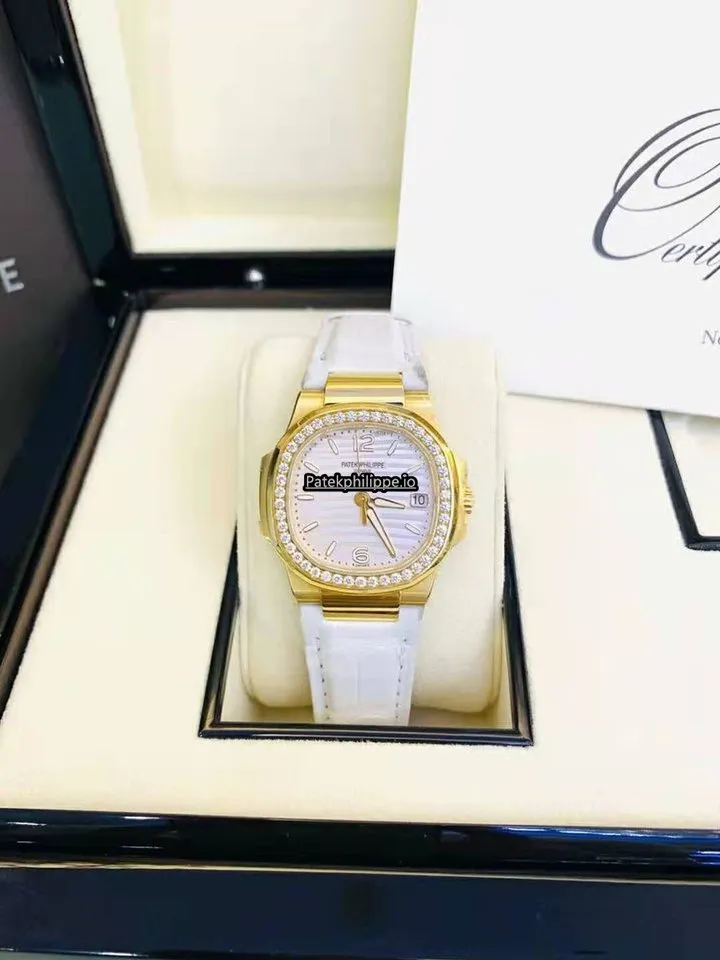 Patek Philippe Nautilus 7010r-011 32MM Yellow Gold Case Quartz
