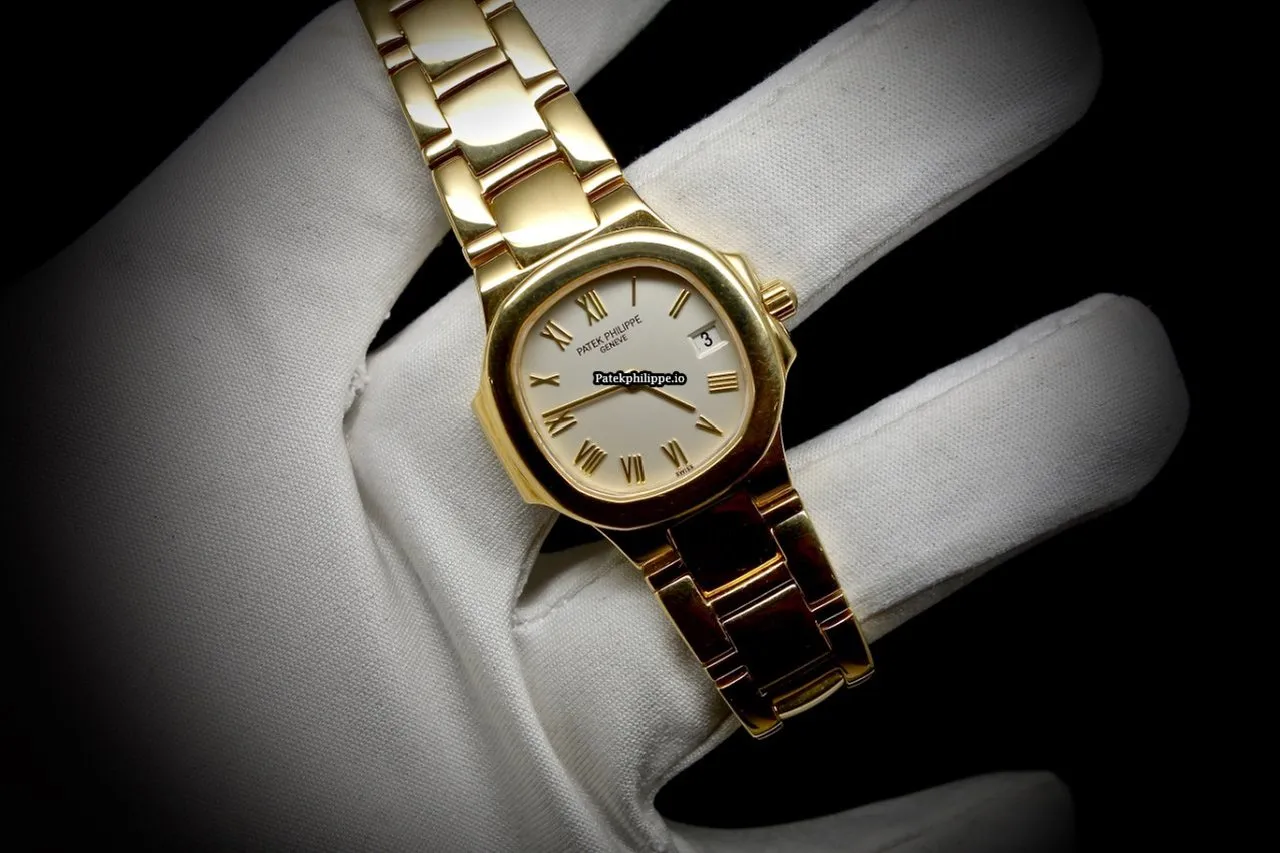 Patek Philippe Nautilus 4700/51j 27x25MM Yellow Gold Case Quartz